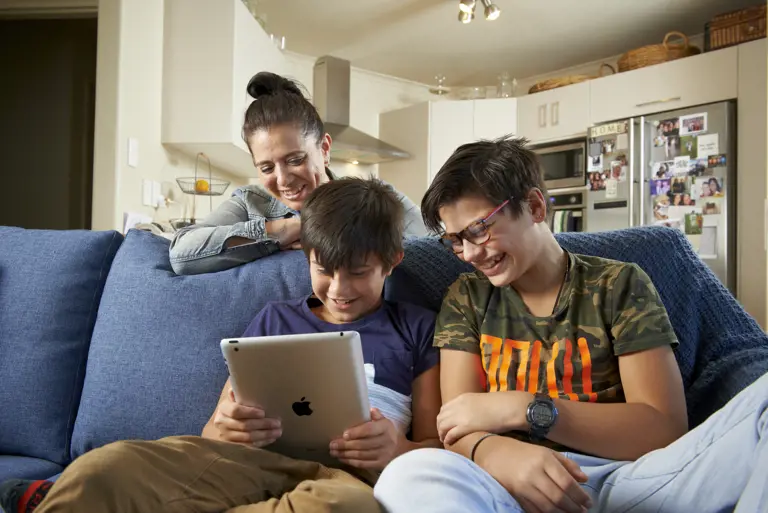 Family using technology at home
